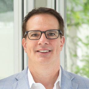 Dr. David Martinelli, Director of the West Virginia Small Satellite Center and Professor in the Wadsworth Department of Civil and Environmental Engineering, poses for a photo. He is dressed professionally, with a confident expression. The background sugge