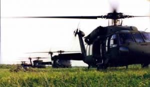 Three Black Hawk Helicopters in formation flight