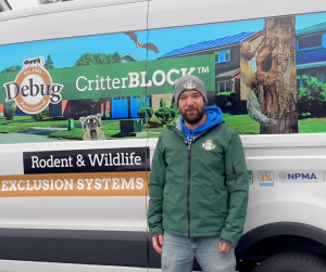 Tim Horgan in front of CritterBlock van