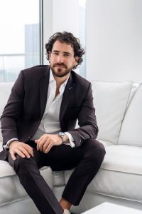 Alex Perry, seen here in this portrait, said the 2025 home market has started strong in Dallas. He is ranked the #1 real estate agent by RealTrends,.