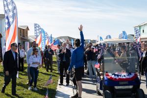 Counihan Waving To Crowd At New Home