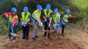 EAB, FFTP, UpMobility, The Archdiocese, and Local Community Members At the future site of Zion Entrepreneurial Village