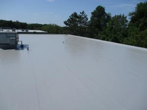 Completed PVC grey roof on a commercial building campus