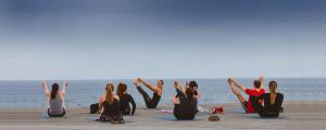 See Yoga Retreats Beach Yoga Class in Gran Canaria Canary Islands