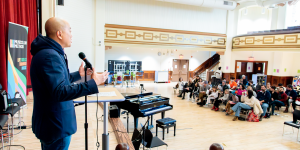 Founder & Director Andrew Ingkavet welcomes parents and students to Winter Recital 2025