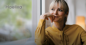 Image of woman sitting in a window