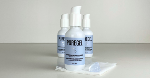 Three bottles of PureGel™ shown with gel in a pile in front of them on top of gauze.