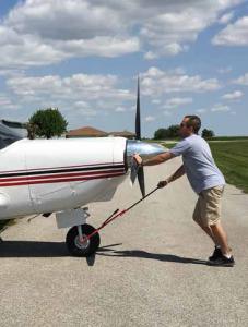 Doctor Matthew Bogard MD, Nebraska, with Comanche Airplane