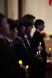 Young men in tuxedos singing