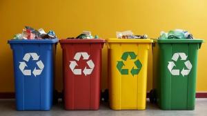 Four recycling bins full of waste to indicate the importance of properly recycling your e-waste