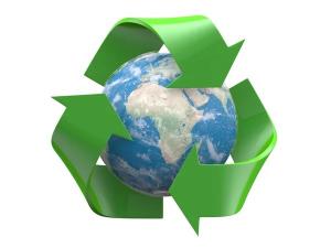 Image of the earth with a recycling logo around it to represent responsible and sustainable electronics recycling