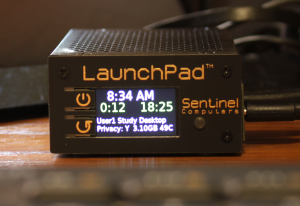 LaunchPad front panel shown with color display indicating time of day, time to screen break, remaining login time, privacy level and operating status. The front panel buttons serve many functions including power, volume, mute, login, logout and various login options.