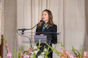 Woman standing at podium