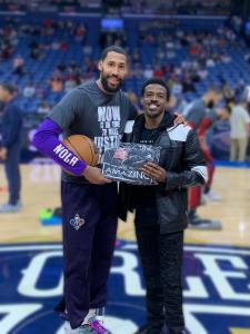 NBA player Garrett Temple supports The Amazing Love Movement. Pictured with Apostle Mardia Scott, Garrett shared how faith played a role in his NBA journey, reinforcing the movement’s ability to inspire hope and perseverance. Photo: Eye Wander