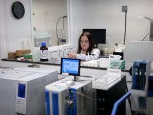 Laboratory technician tests for radon and other contaminants in water