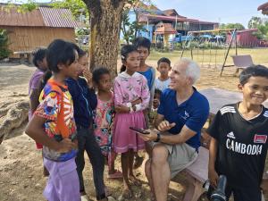 Mateo Solares, Studycat Co-CEO and Co-Founder & Kamrou Krong School Children.