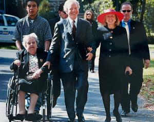 Family walking to synagogue. L-R. Marcia Lieberman (Joe's mother), Joe Lieberman and Hadassah Lieberman