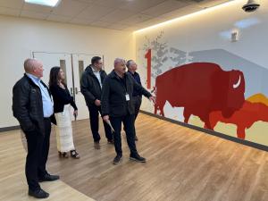 Representatives from Shodair Children's Hospital give a tour to Attorneys Joel Silverman and Tony Dalton of Silverman Law Office, exploring the hospital's facilities.