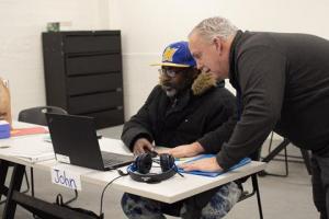 WRTP | BIG STEP instructor Brian Foley works with John Knox, a participant enrolled in the Certified Production Technician High School Equivalency Diploma (CPT HSED) program, on HSED coursework. A$10 million grant from Ascendium Education Group is funding