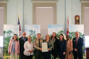 Florida State Parks Director Chuck Hatcher joins members of the Florida State Parks Foundation's Board of Directors at a Legislative Reception on March 19, 2025.