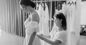 Bride having a bridal fitting