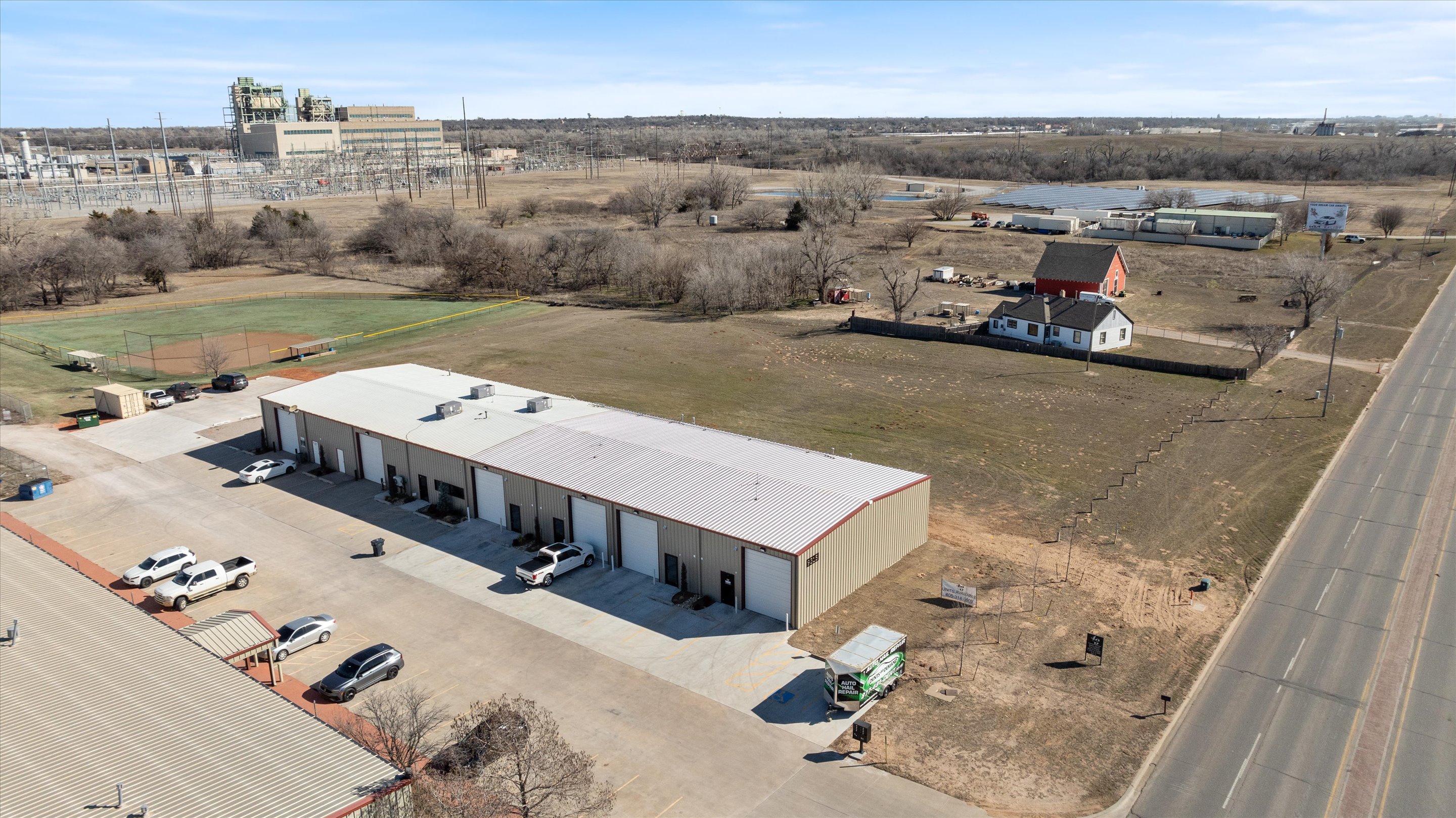 Aerial shot of the front of 9315 W Reno and 9309 W Reno parcel
