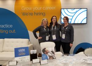 Team members from Pathway at the company's 2019 WVC booth