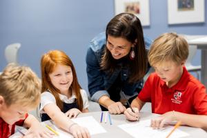 Revolution Academy Public Charter School Teacher & Students