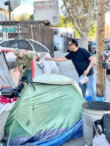 Kenny Dewan  bringing warmth and care to those in need.