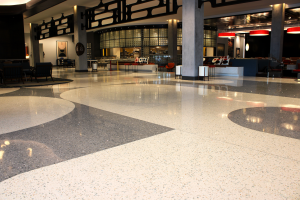 Terrazzo design: '70s style curves in the floor in gray and white terrazzo