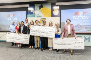 Winners of The Patton Foundation Entrepreneur Challenge at The University of Tennessee at Chattanooga holding large check