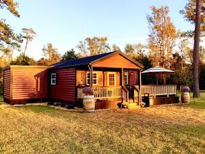 Queen’s Landing Cabin at Sweet Valley Ranch — handcrafted from wood milled on the property and built as a lasting tribute to family, faith, and legacy.