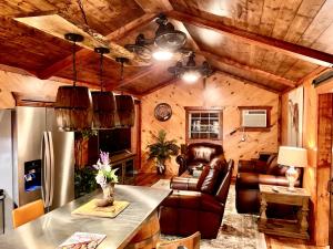 Inside Queen’s Landing Cabin: warm woodwork, handcrafted details, and rustic comfort that reflects the heart of Sweet Valley Ranch.