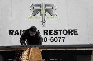 R&R Foundation Specialist | Employee Working | Seattle Foundation Repair
