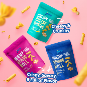Jans Spring Roll Snacks display at the 2025 Sweets & Snacks Expo, featuring golden-brown bites in branded packaging and tasting samples.