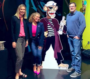 Carrie “Ms. NFTy” Lyn, Sailor Gary of Bored Ape Yacht Club and Spirit Punks, and members of the California Blockchain Advocacy Coalition pose with a branded Spirit Punks Bored Ape cutout during the Sacramento stop of the California Crypto Tour—highlightin
