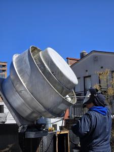 Hood Cleaning Technician Cleaning a Commercial Exhaust System in South Florida