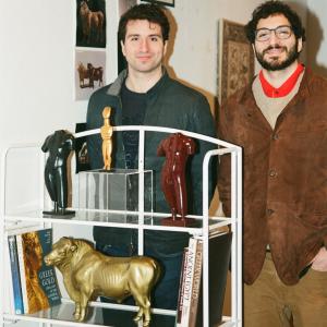 Alexander and Soliman Aboutaam, Co-Founders of Antico Contempo posing with three contemporary figures
