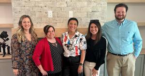 The California Closets team at the floor signing.