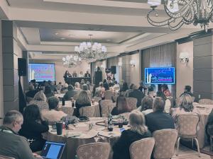 photo of a conference room with more than 100 people in attendance at the UCP Annual Conference.