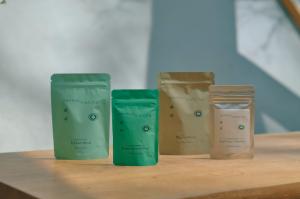 Product photo showing four Zenkyu Matcha packages arranged in a row: Uji Latte Blend, Zenkyu Signature Blend, Hojicha Powder, and Single Origin – Okumidori.