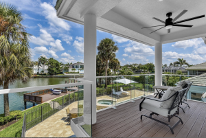 Luxury 5-bedroom, 3.5-bath Naples vacation rental at Sailboat Pointe with private pool, spa, boat dock, Gulf access via Doctor’s Pass, near dining and beaches.