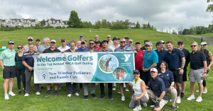 Group photo of attendees at the YMCA of Middletown Golf Outing at Mansion Ridge, including community members, sponsors, and staff supporting the Strong Kids Campaign.