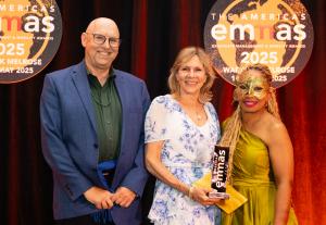 Cathy Heyne and Michael Cadden accept Living Abroad's 2025 FEM Americas EMMA for International Health, Wellbeing, or Security Management Provider of the Year