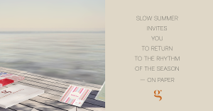 Quote reading “Slow Summer invites you to return to the rhythm of the season — on paper” beside a serene dockside flatlay of Glimmery Moments’ stationery.