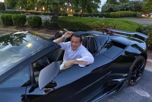 Alex Rozwadowski in a car