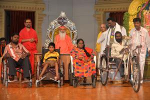 Sri Swamiji has donated tricycles and support vehicles to the communities of weaker sections