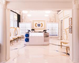 The Apollo Studio front desk and jewelry display case area