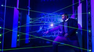 Player tries to navigate through laser tripwires at Time Mission Manassas Mall.