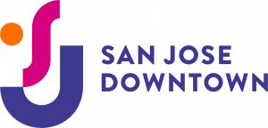 logo of san jose downtown association with orange, pink, and purple smile face and san jose downtown written in purple all caps letters